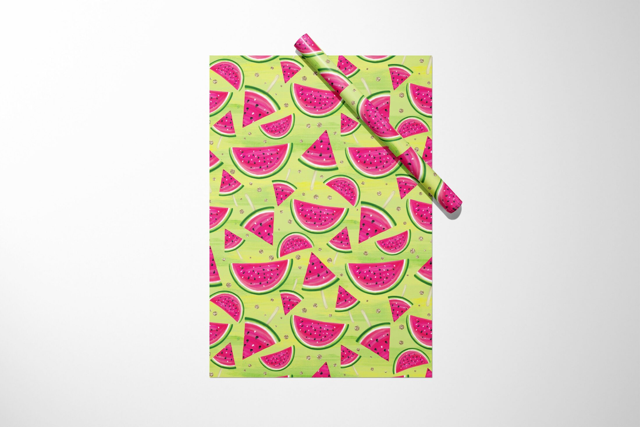 A towel with Watermelon Fruit Wrapping Paper on it, perfect for a birthday or bridal gift.