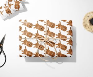A Spaniel Dog Wrapping Paper with a brown bear on it.