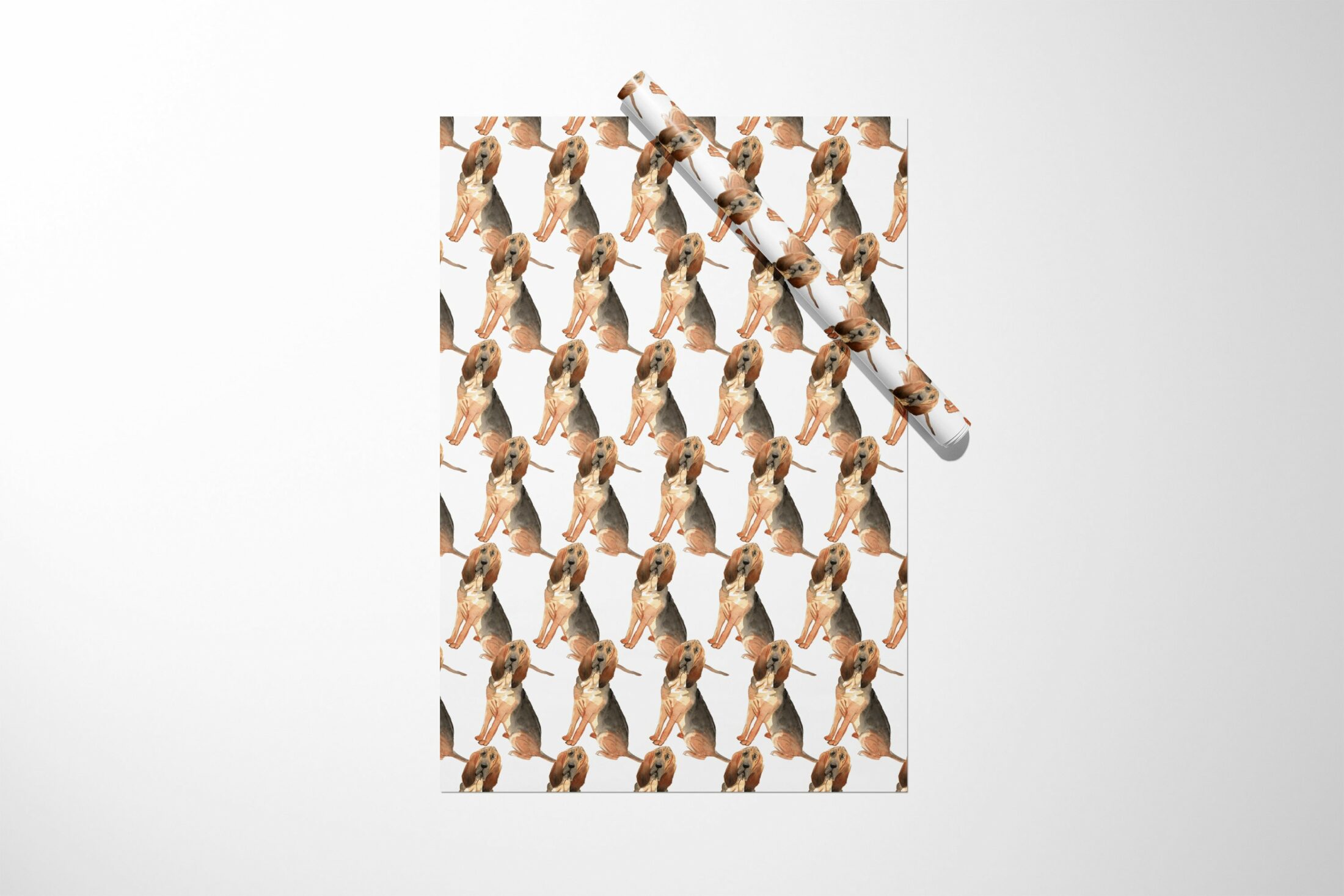 A Christmas gift wrapped in Bloodhound Dog Wrapping Paper.