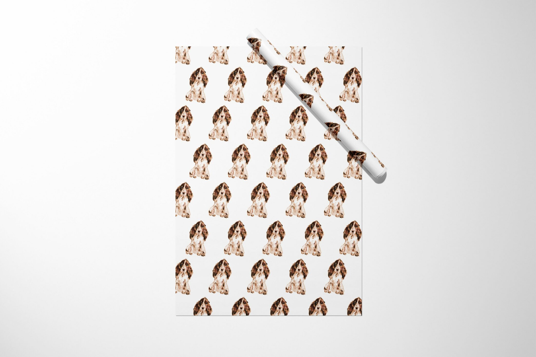 A gift wrap with a Cocker Spaniel Wrapping Paper on it.