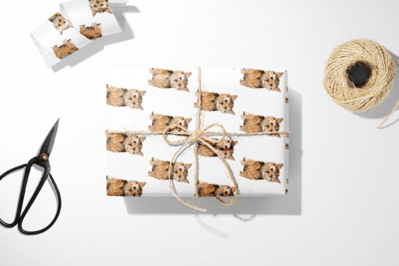 A gift wrapping paper with a Norfolk Terrier on it.