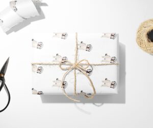 A Shih Tzu Dog wrapping paper with scissors and a pair of scissors.