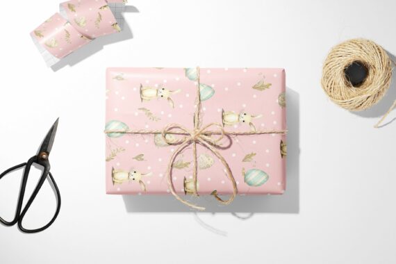 A pink Bunny and Egg wrapping paper with a bunny on it.