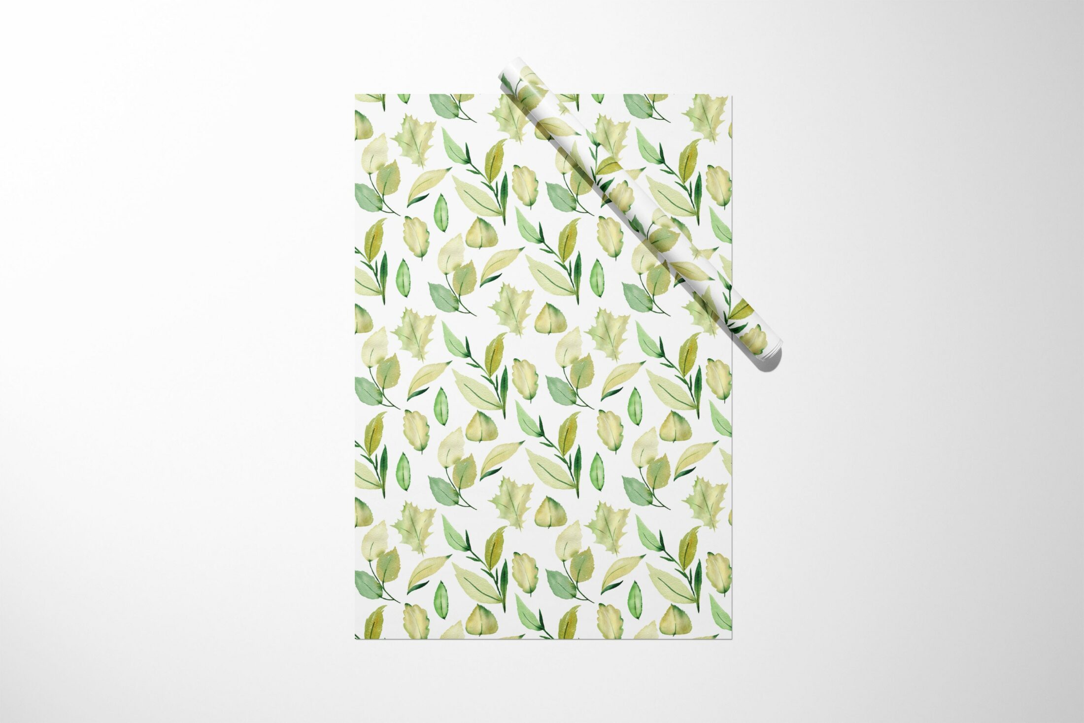 Christmas gift wrap with Green Leaves Wrapping Paper on it.