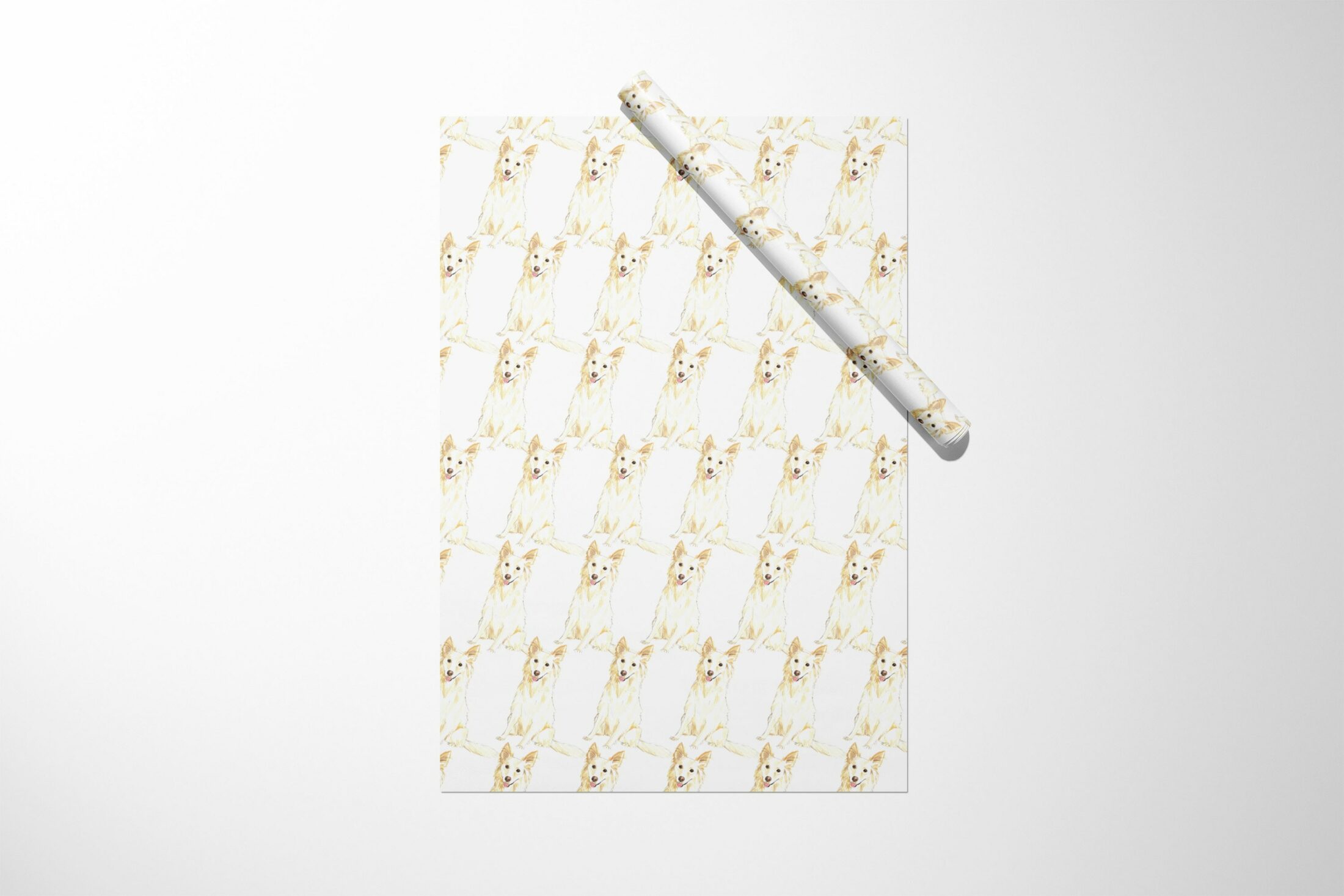 A White Border Collie wrapping paper with a gold pattern on it, perfect for Christmas presents.