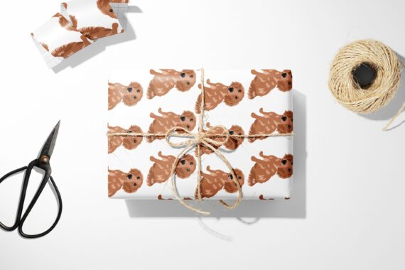 Brown Dog Wrapping Paper and scissors on a white surface, perfect for Christmas gifts.