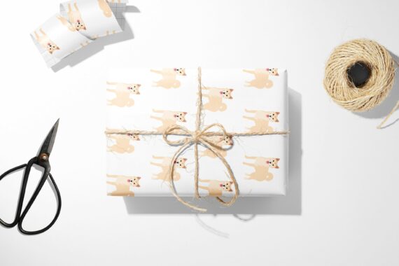 Akita Dog Wrapping Paper with a bunny and scissors next to it.
